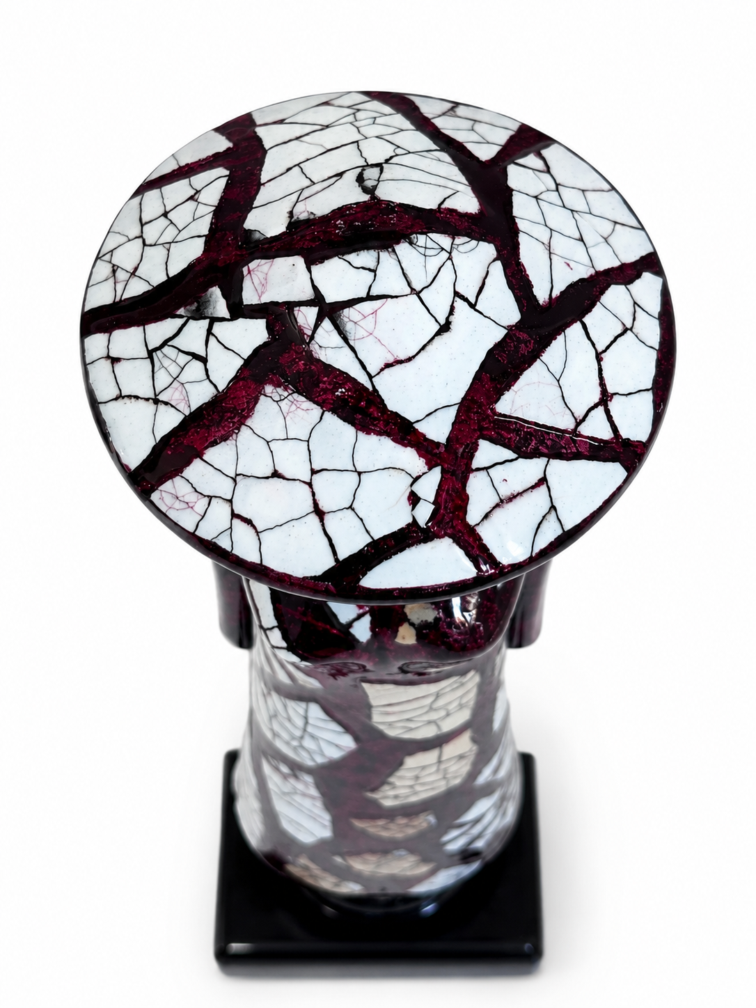 Close-up of eggshell inlay and glossy lacquer finish on a Vietnamese Ao Dai lady statue.
